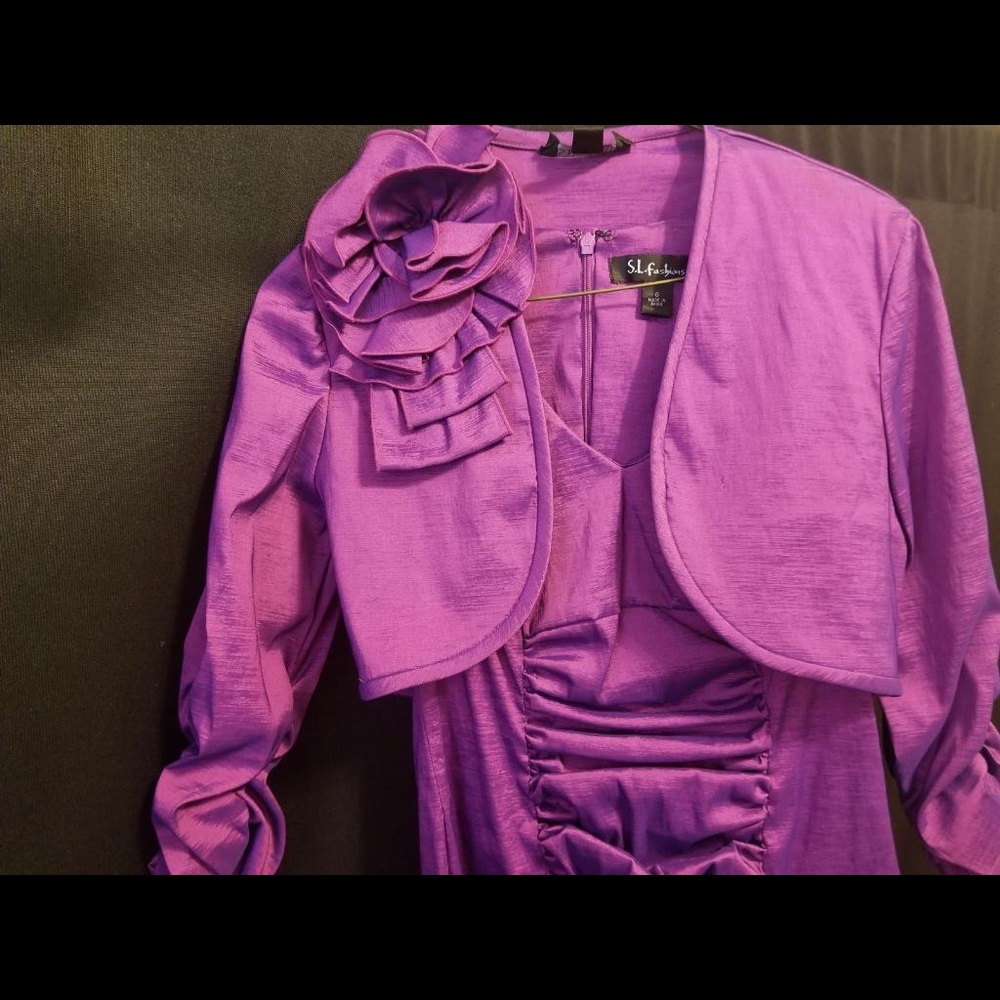 Two piece purple jacket and ruffle dress